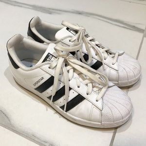 ADIDAS white core and black stripes shoes